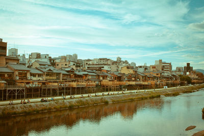 View of city against cloudy sky