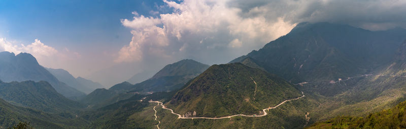 Panoramic view of mountains against sky at night