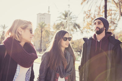 Young couple standing in city