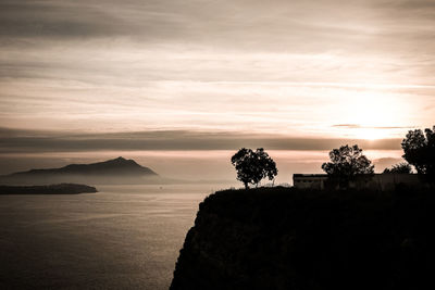 Scenic view of sea against sky at sunset