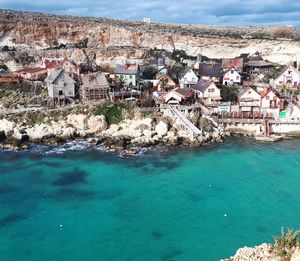 High angle view of buildings in sea