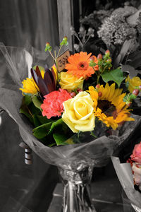 Close-up of yellow roses in vase