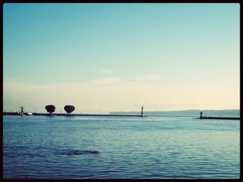 Scenic view of sea against blue sky