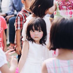 Portrait of cute girl holding toy