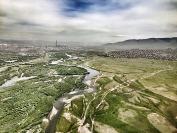 High angle view of landscape against cloudy sky