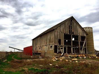 Abandoned factory against sky