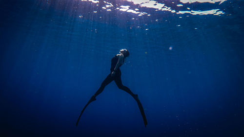 Man swimming in sea