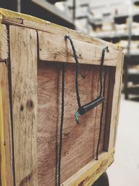 Close-up of wooden hanging outdoors