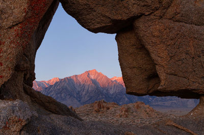 Sunrise on the sierra nevadas viewed through boot arch