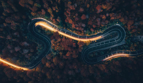 High angle view of illuminated road at night