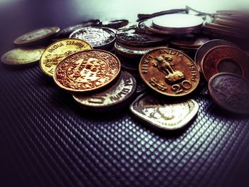 High angle view of coins on table