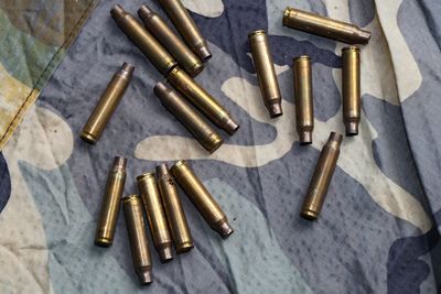 High angel view of ammunition on fabric