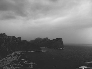 Scenic view of bay against sky