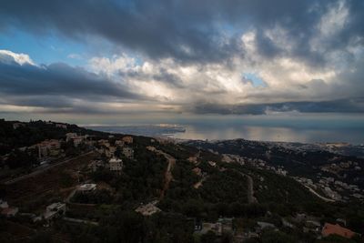 Aerial view of cityscape against sky