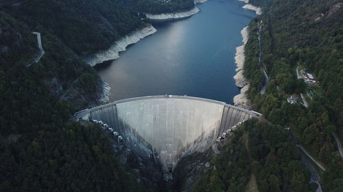 High angle view of dam amidst trees