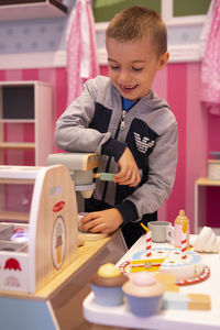 Happy boy looking at food
