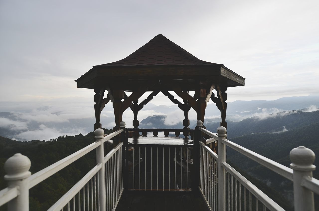 sky, mountain, architecture, built structure, nature, railing, cloud - sky, beauty in nature, mountain range, tranquility, day, no people, scenics - nature, tranquil scene, building exterior, outdoors, belief, water, religion, travel destinations