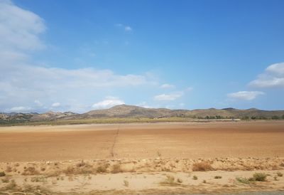 Scenic view of desert against sky