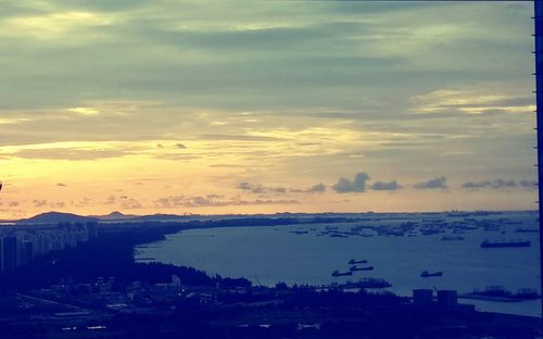 High angle view of buildings against sky at sunset