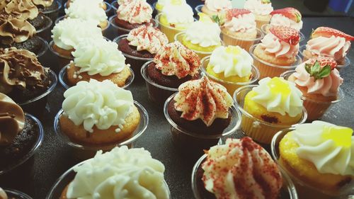 Cupcakes arranged in row