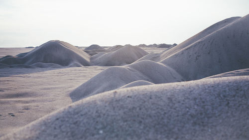 Scenic view of desert against clear sky