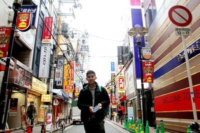 Woman standing in city