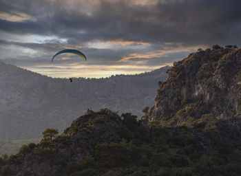 Low angle view of parachute on mountain