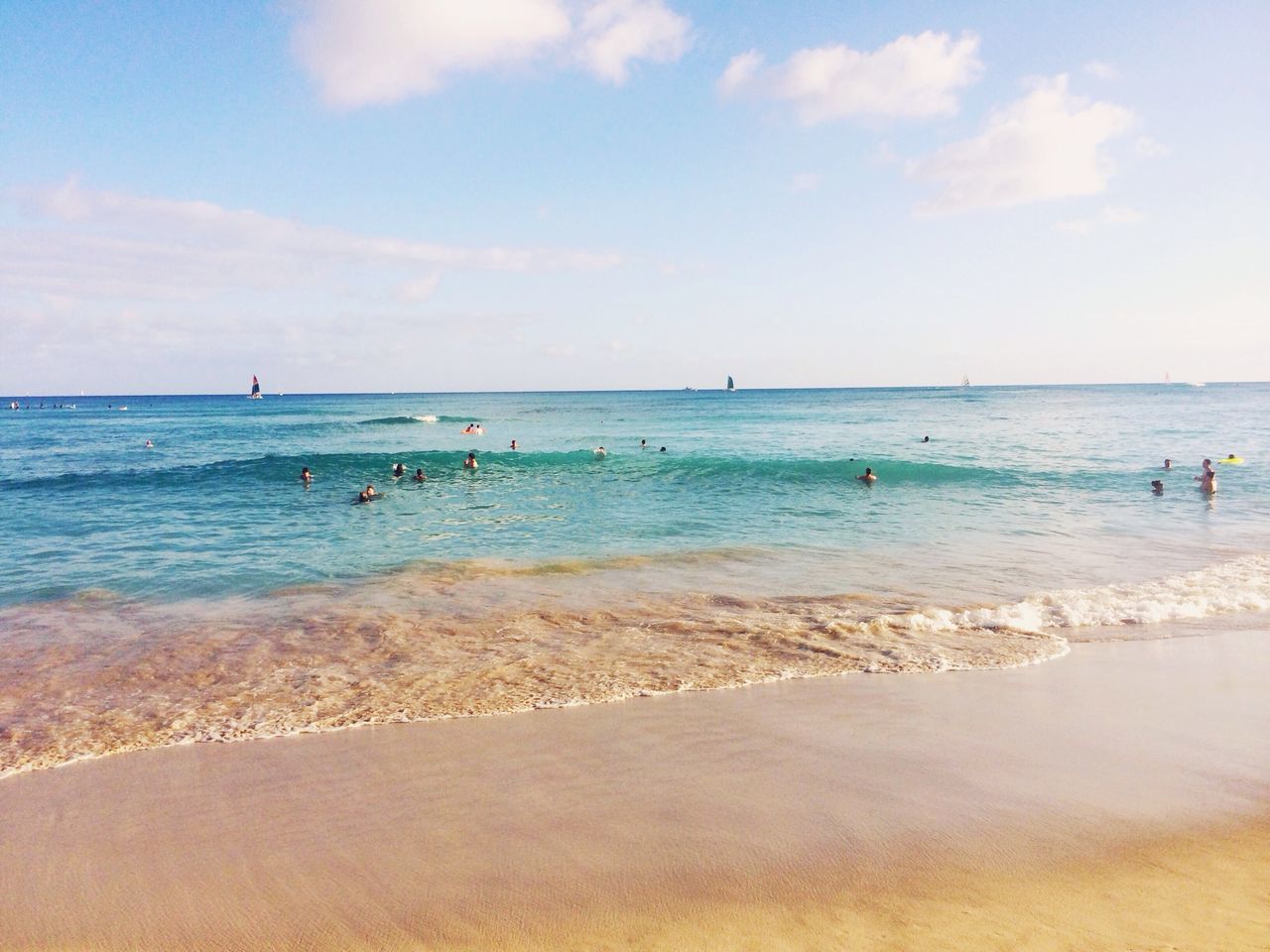 sea, beach, water, horizon over water, sand, shore, sky, scenics, beauty in nature, tranquil scene, tranquility, wave, incidental people, nature, vacations, cloud - sky, idyllic, day, outdoors