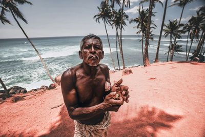 Portrait of man on beach