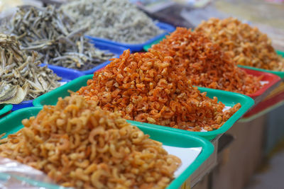 Closeup of deep fried fish, shrimp - traditional vietnamese cuisine in dam market, nha trang city