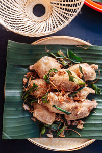 High angle view of meat in plate on table