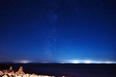 Scenic view of star field against sky at night