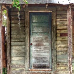 Closed wooden door of house