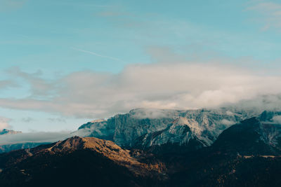 Scenic view of snowcapped mountains against sky