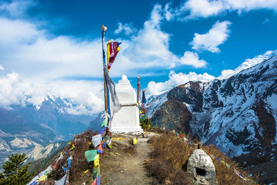 Scenic view of snowcapped mountains against sky