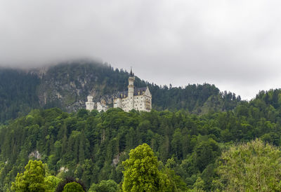 Neuschwanstein castle above the village hohenschwangau near fuessen in bavaria, germany