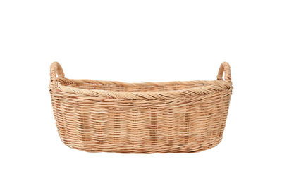 Close-up of wicker basket against white background