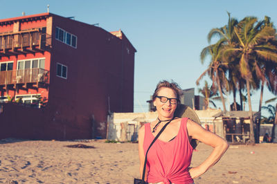 Retired woman enjoying sunset at the beach in mexico