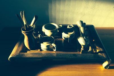 High angle view of objects on table against wall