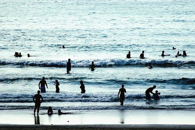 View of silhouette tourist on beach