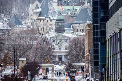 Buildings in city during winter