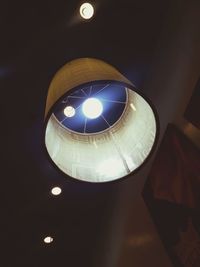 Low angle view of illuminated ceiling