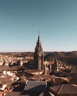 High angle view of buildings in city against clear sky
