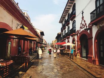 Alley amidst buildings in city