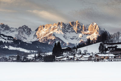 Scenic view of snowcapped mountains against sky during winter