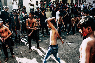 Group of people at street in city