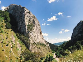 Low angle view of rocks against sky