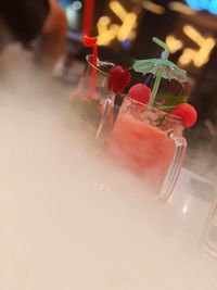 Close-up of cocktail in glass on table