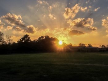 Scenic view of landscape against sky during sunset