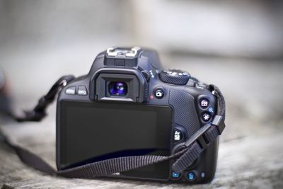 Close-up of camera on table